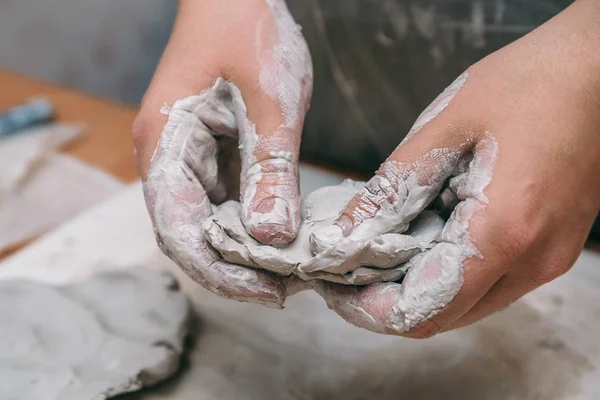 Female potter works with clay, craftsman hands close up — Stock Photo, Image