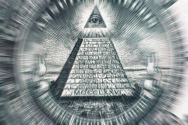 Conspiracy theory concept. All Seeing Eye and Pyramid on USA dollar banknote, macro photo clipart
