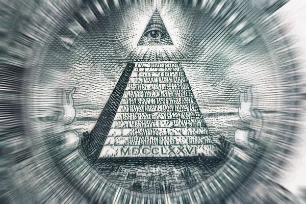 Konsep teori konspirasi. All Seeing Eye and Pyramid on USA dollar banknote, macro photo Stok Gambar