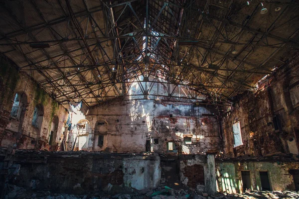 Disaster concept, inside old ruined abandoned industrial factory building, large creepy hall interior — Stock Photo, Image