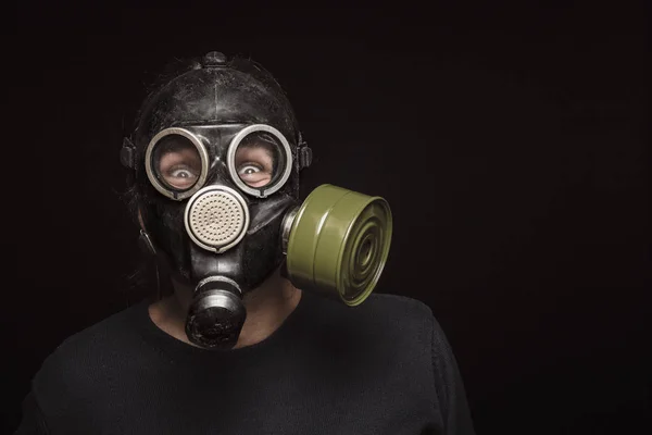 Portrait of man in gas mask with furious eyes, copy space — Stock Photo, Image