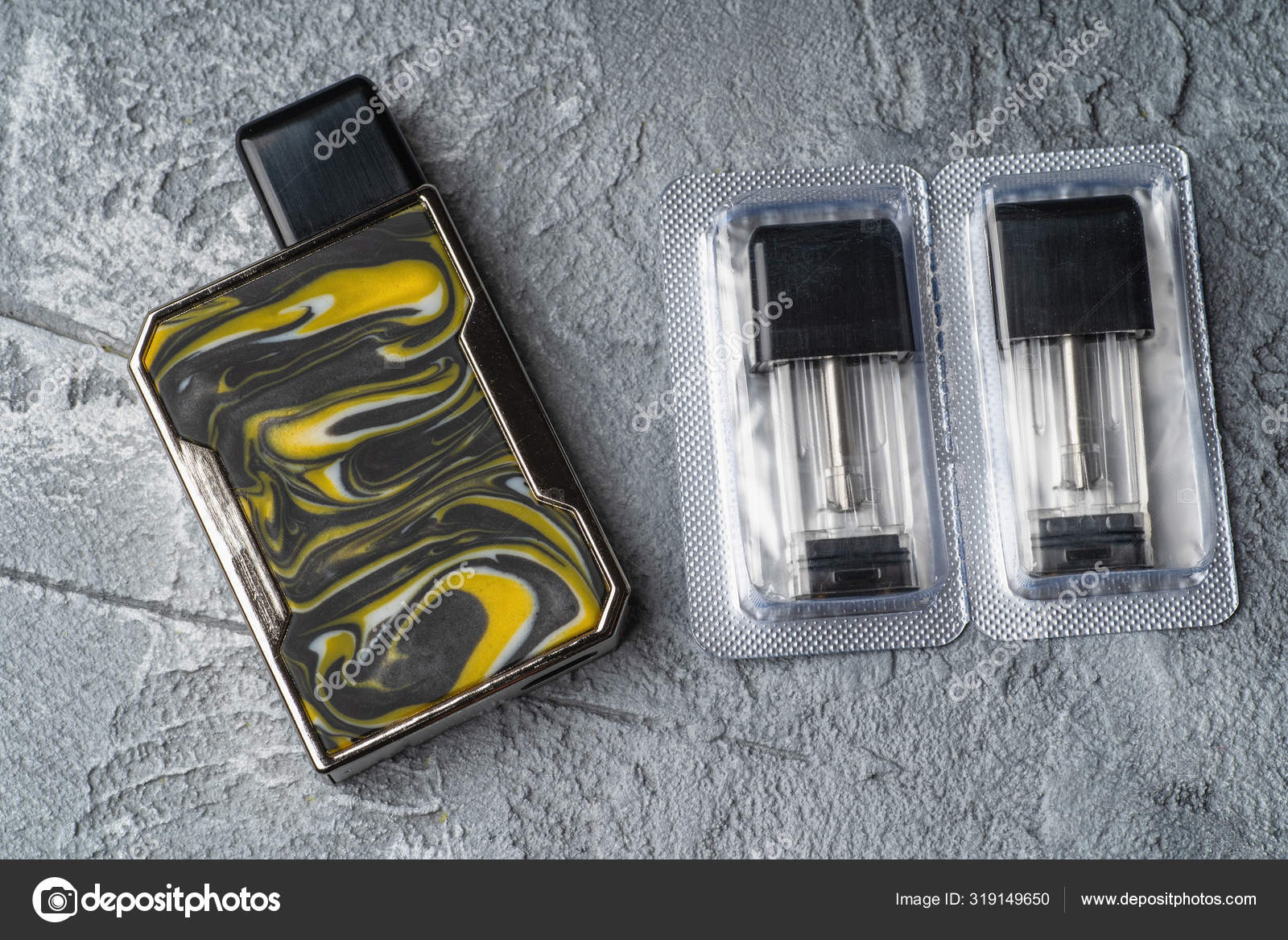 Vape Pod System Or Pod Mod With Changeable Cartridges Close Up.