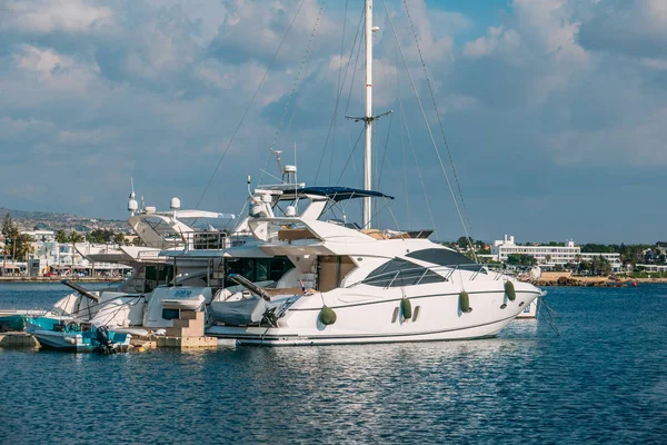 Paphos, Cyprus - November 2019 : Ships and boats at Paphos harbor near town embankment — Stock Photo, Image