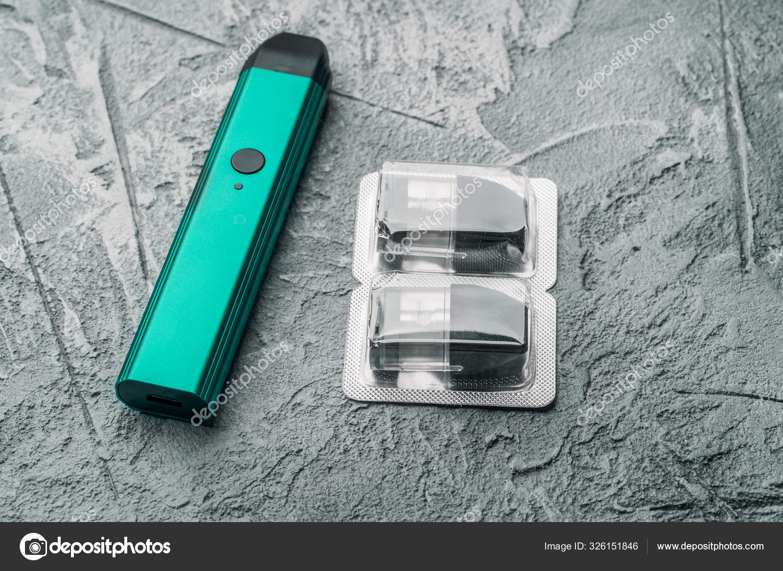 Vape pod system or pod mod with changeable cartridges close up small