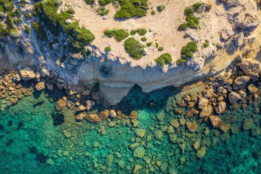Sea aerial top view, amazing azure water nature background with rock cliff in Cyprus, mediterranean landscape from above