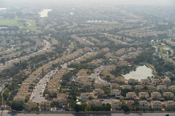 Aerial view of Dubai with villas and houses of local residents in morning dusk, United Arab Emirates — Stock Photo, Image