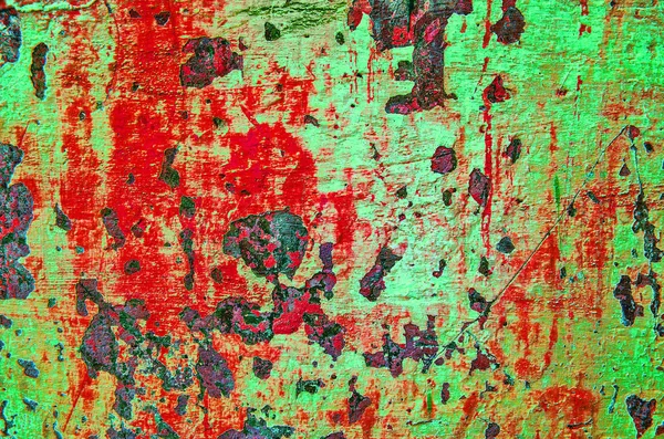 Фрагмент абстрактной окрашенной красной и зеленой трещин стены или красного цвета старой каменной поверхности для различных видов применения — стоковое фото
