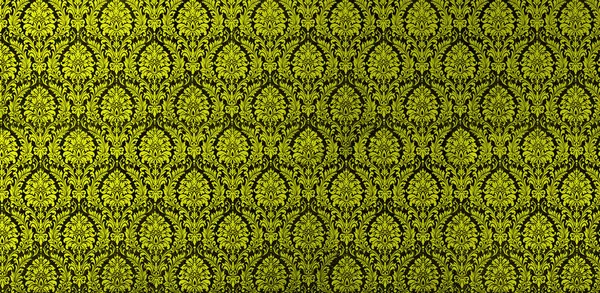 Fragment of ornamental wallpaper colored , or abstract surface of tiled flowers and leaves  pattern, or texture useful as a background vignetted and gradient background — Stock Photo, Image