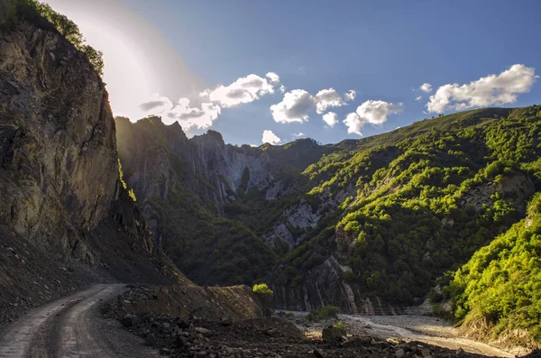 Cycling mountain road. Misty mountain road in high mountains.. Cloudy sky with mountain road. Big Caucasus. Azerbaijan Lahic