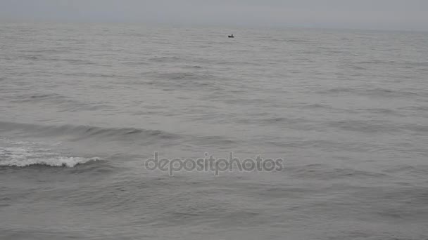 Fishing boat at the seaside of Caspian Sea in stormy weather. Absheron Novkhani Azerbaijan — Stock Video