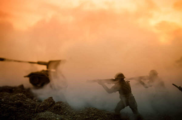 War Concept. Military silhouettes fighting scene on war fog sky background, World War Soldiers Silhouettes Below Cloudy Skyline At night. Attack scene. Armored vehicles. Tanks battle