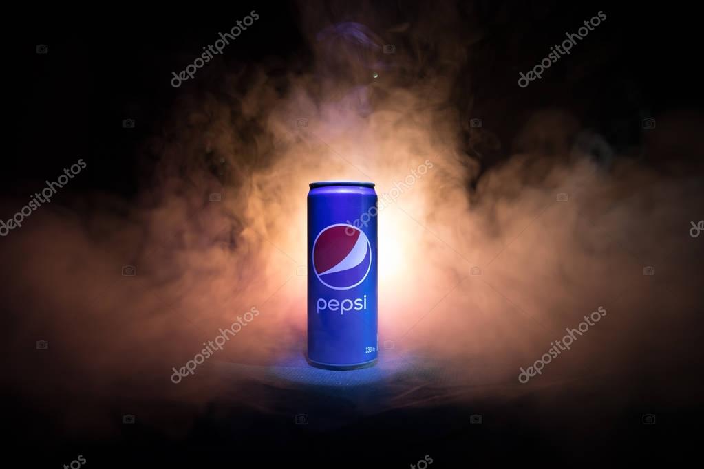 BAKU, AZERBAIJAN - JANUARY 13,2018 : Pepsi can against dark toned foggy background. Pepsi is a carbonated soft drink produced by PepsiCo.