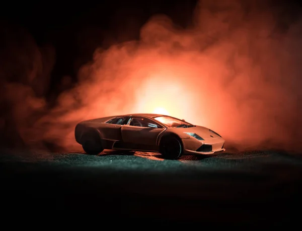 Baku, Azerbajdzjan - januari 13 2018: Leksak Lamborghini Diablo på mörk dimmig bakgrund. Skala modellvy. — Stockfoto