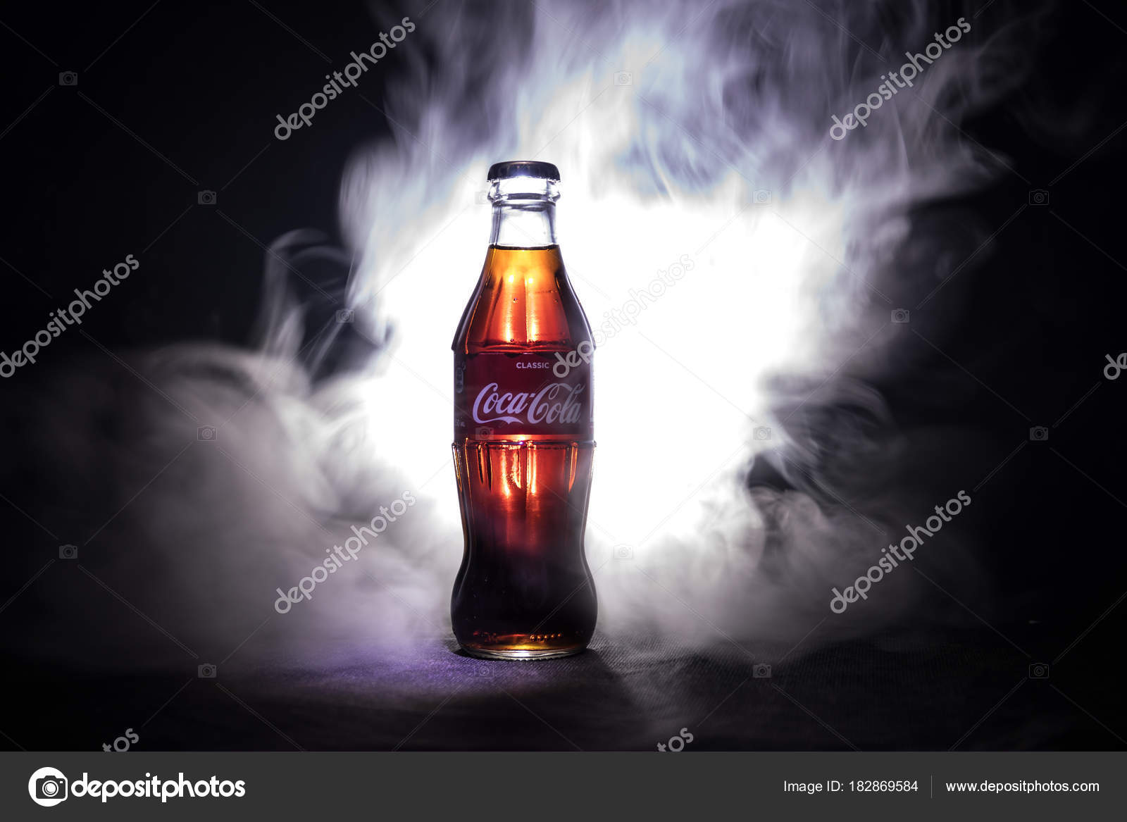 Coca Cola with Ice, Bottle, Glass, Cup Editorial Stock Photo