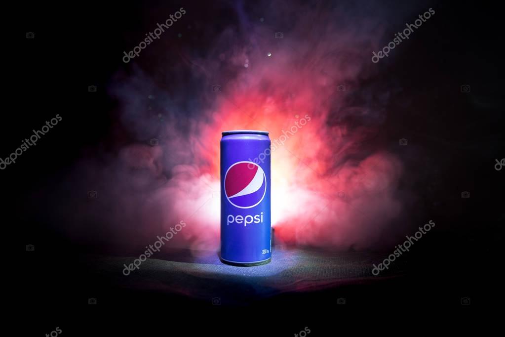 BAKU, AZERBAIJAN - JANUARY 13,2018 : Pepsi can against dark toned foggy background. Pepsi is a carbonated soft drink produced by PepsiCo.
