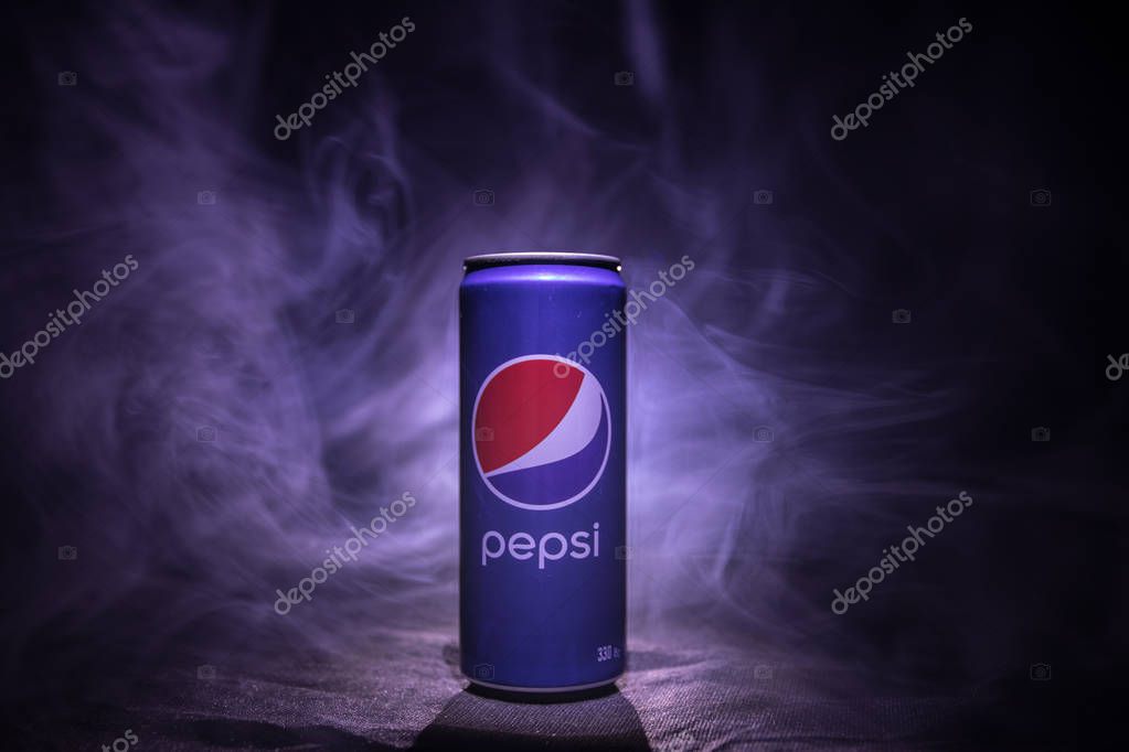 BAKU, AZERBAIJAN - JANUARY 13,2018 : Pepsi can against dark toned foggy background. Pepsi is a carbonated soft drink produced by PepsiCo.