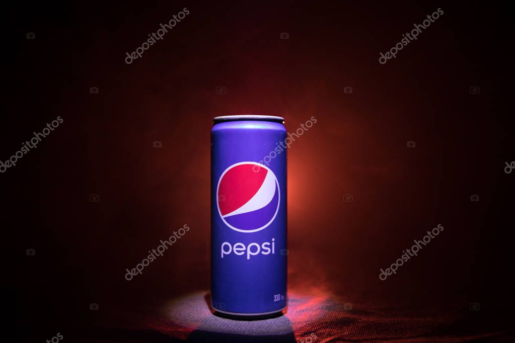 BAKU, AZERBAIJAN - JANUARY 13,2018 : Pepsi can against dark toned foggy background. Pepsi is a carbonated soft drink produced by PepsiCo.