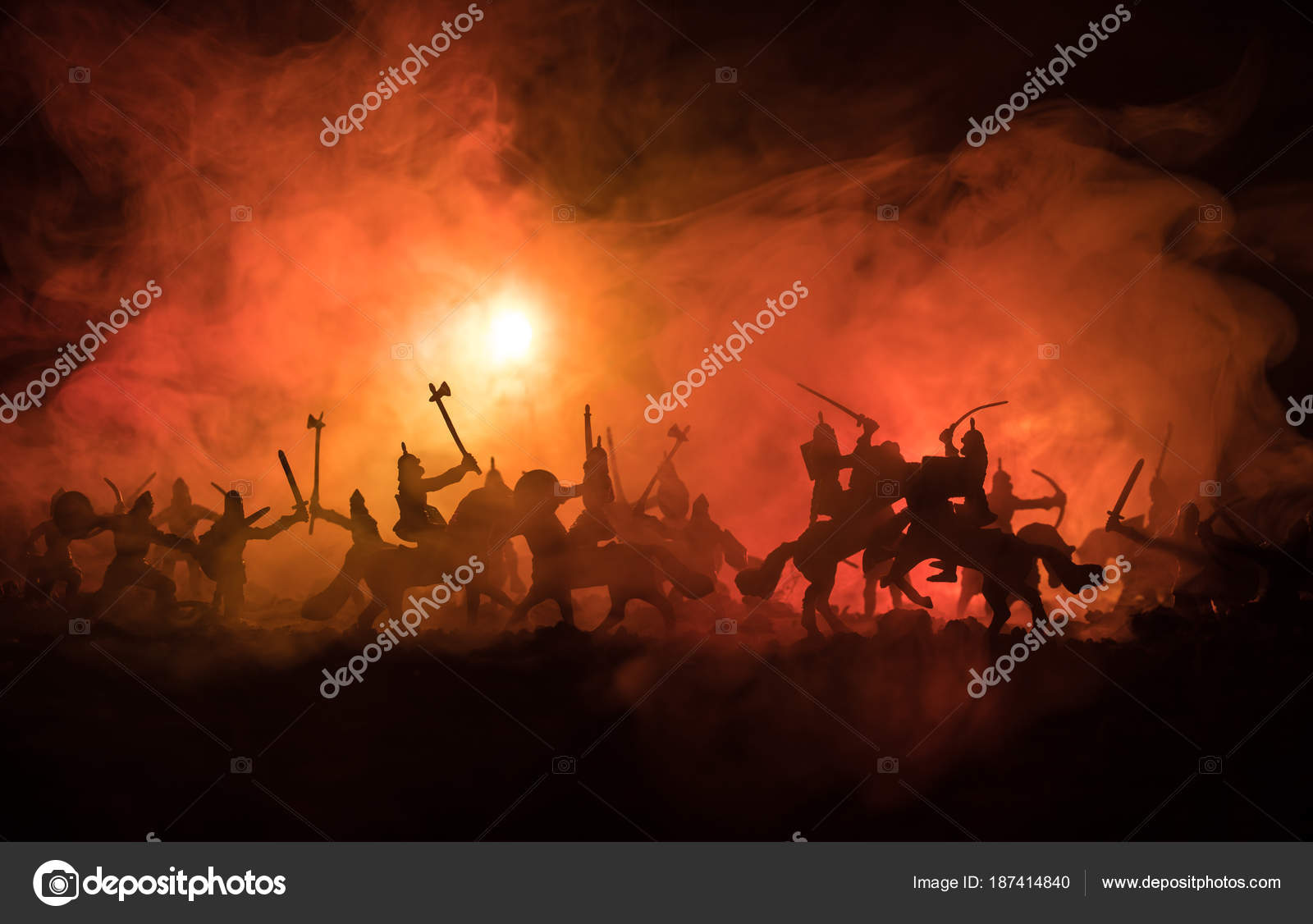 Medieval battle scene with cavalry and infantry. Silhouettes of figures