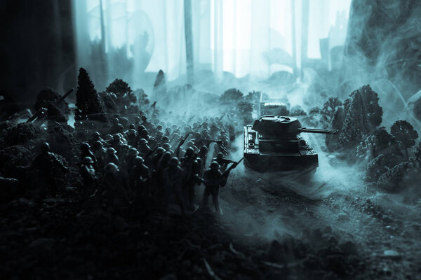 War Concept. Military silhouettes fighting scene on war fog sky background, World War Soldiers Silhouettes Below Cloudy Skyline. Armored vehicles. Tanks battle. Decoration