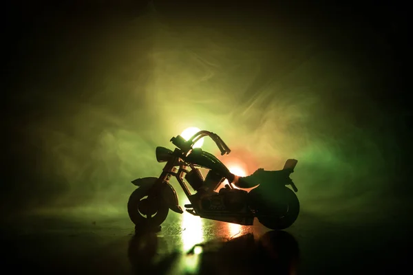 High power motorcycle chopper. Fog with backlights on background with man rider at night. Empty space — Stock Photo, Image