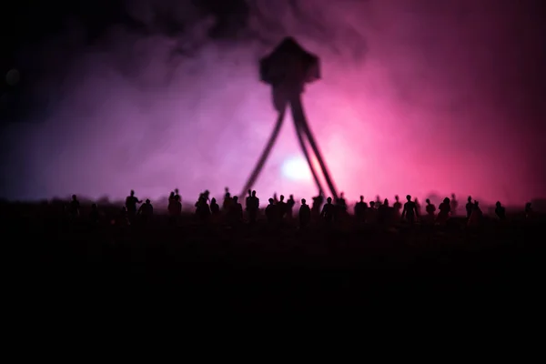Blurred silhouette of giant monster prepare attack crowd during night. Selective focus. Decoration