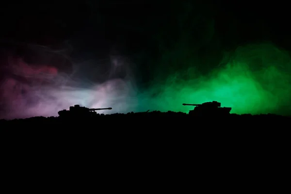 War Concept. Military silhouettes fighting scene on war fog sky background, World War German Tanks Silhouettes Below Cloudy Skyline At night. Attack scene. Armored vehicles. Tanks battle. Close up — Stock Photo, Image