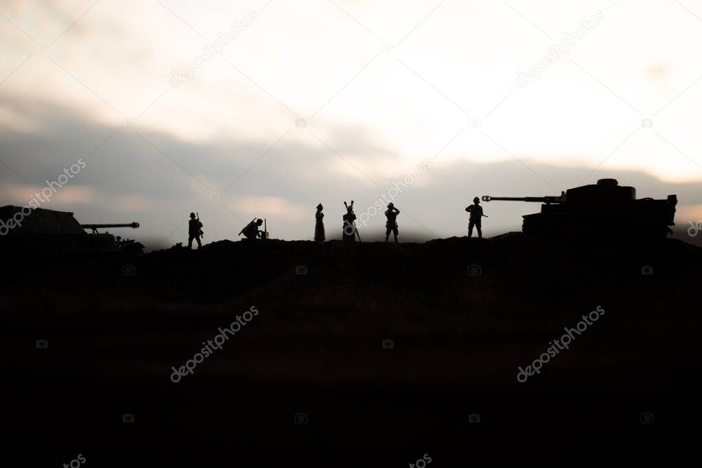 War concept. Creative composition. Silhouette of German general at the desert. Army commanders watching to the battle.