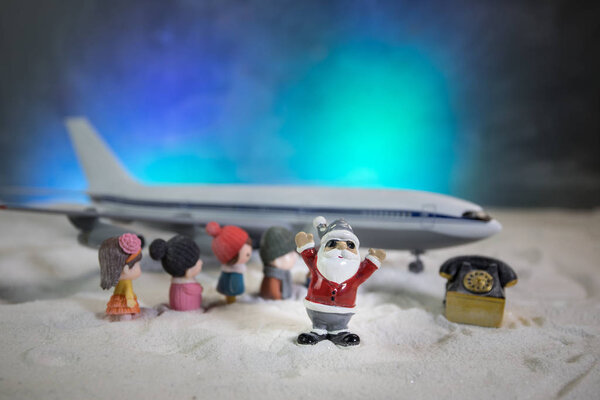 Merry Christmas and Happy new years travel concept background for winter trip on wood background , Travel with airplane top view with copy space.