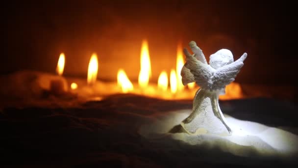 Close Footage Christmas Composition Burning Candles Angel Figure — Stock Video