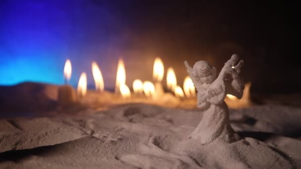 Close Footage Christmas Composition Burning Candles Angel Figure — Stock Video