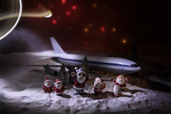Merry Christmas and Happy new years travel concept background for winter trip on wood background , Travel with airplane top view with copy space.