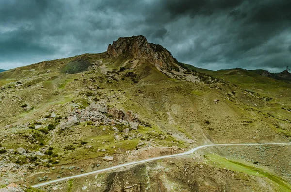Cycling mountain road. Misty mountain road in high mountains.. Cloudy sky with mountain road. Azerbaijan nature