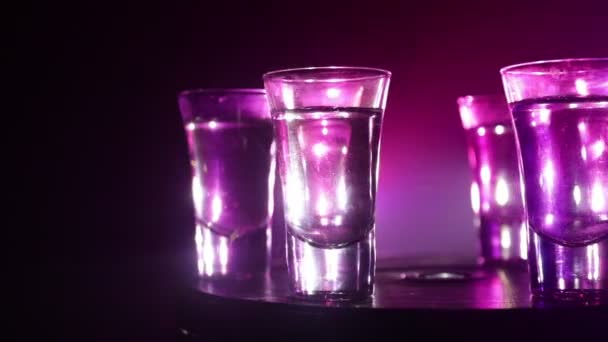 Beautiful Carafe Vodka Stands Wooden Table Glasses Dramatic Toned Foggy — Stock Video