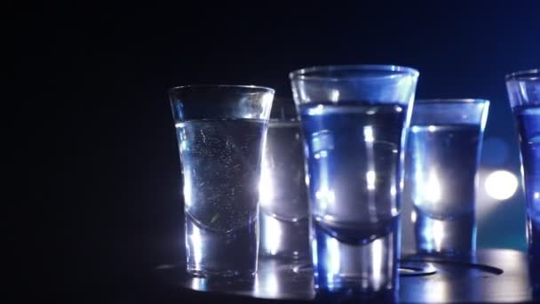 Beautiful Carafe Vodka Stands Wooden Table Glasses Dramatic Toned Foggy — Stock Video