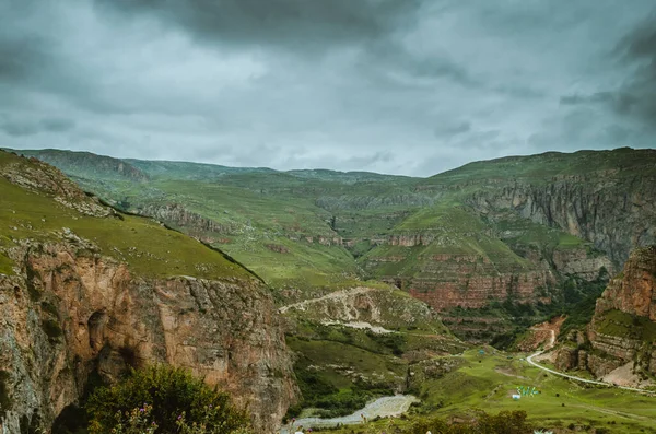 Cycling mountain road. Misty mountain road in high mountains.. Cloudy sky with mountain road. Azerbaijan nature