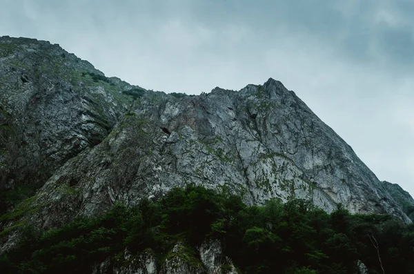 Cycling mountain road. Misty mountain road in high mountains.. Cloudy sky with mountain road. Azerbaijan nature