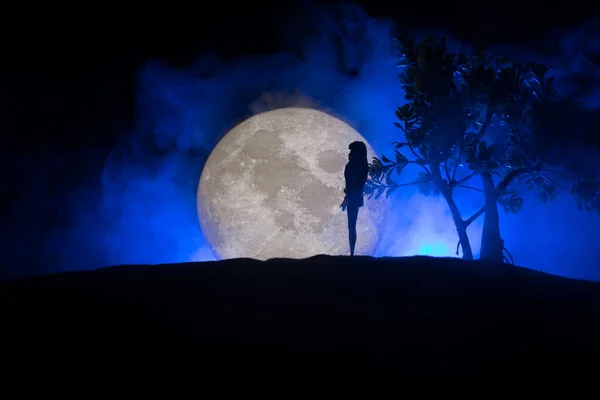 Girl Standing Alone Big Full Moon Dark Toned Foggy Background — Stock Photo, Image