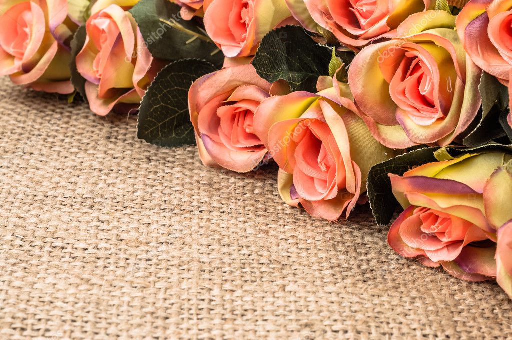 Download Wedding roses on rustic jute background. Flowers ...