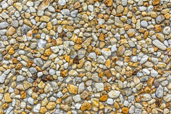 Wall of small stones texture background, natural gravel background texture — Stock Photo, Image