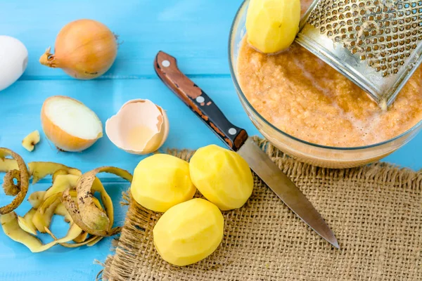 Homemade potato dough and ingredients for traditional potato pancakes, cooking recipe — Stock Photo, Image