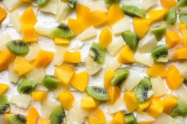 Renkli meyve arka plan dokusu gelen meyve dilimleri - kivi, ananas, üzüm