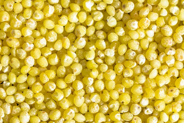 Grano crudo di cereali - texture di fondo del miglio, un concetto di alimentazione sana — Foto Stock