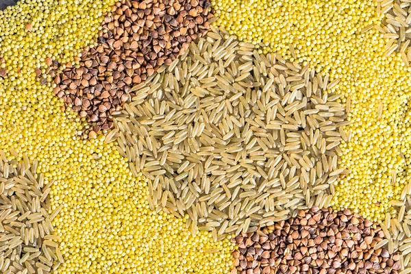 Various grain of cereal texture background - rice, millet buckwheat, top view