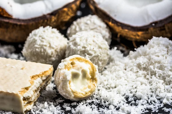 Coconut balls in coconut flakes and coconut wafer — Stock Photo, Image