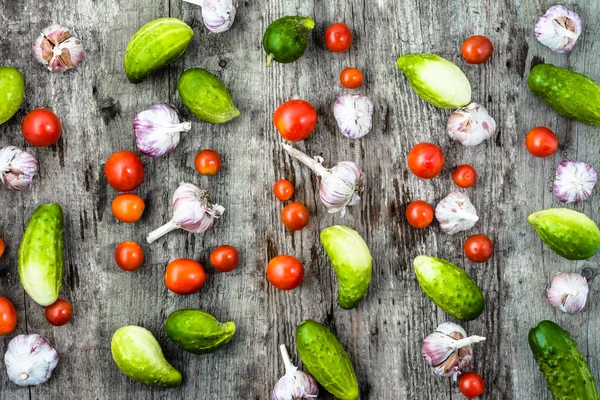 Various vegetables, flat lay, overhead on wooden background