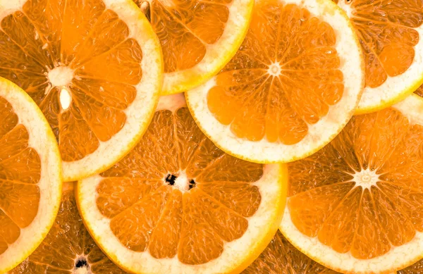 Textura de rodajas de frutas de naranja, primer plano, gastos generales, fondo cítrico — Foto de Stock