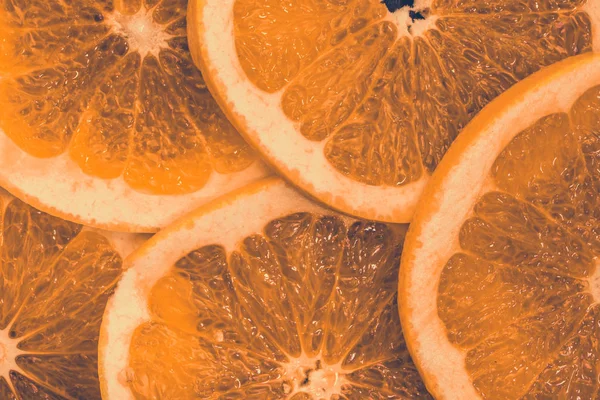 Rodajas de frutas de naranja textura, fondo natural — Foto de Stock