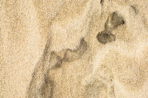 Fundo de areia, textura, praia de areia, padrão na natureza — Fotografia de Stock
