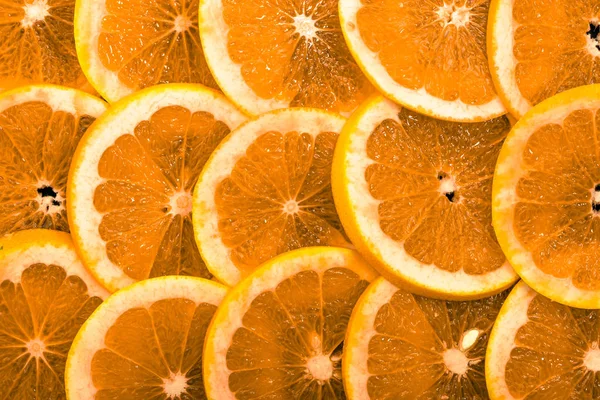 Textura de rodajas de naranja, primer plano, gastos generales, fondo cítrico — Foto de Stock