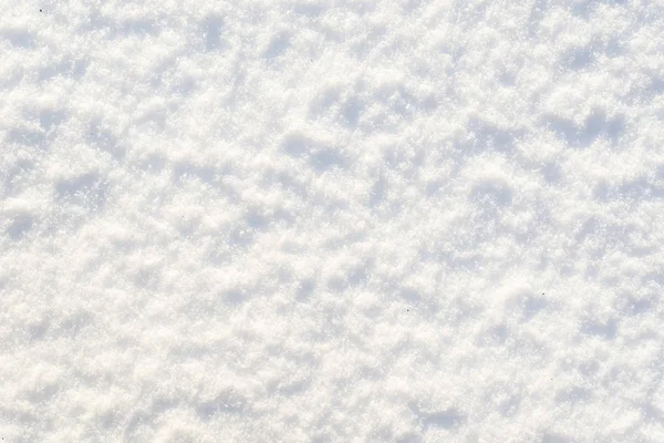 Witte textuur van sneeuw, achtergrond, sneeuwvlokken oppervlak — Stockfoto